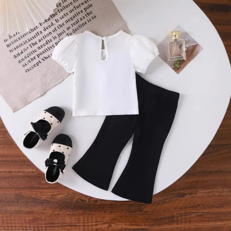 Europe  United States summer girl suit new temperament girl suit  child bubble sleeve short sleeve + micro pants two-piece set